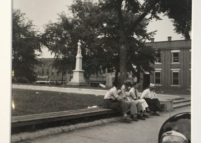 Dorothea Lange – Men Idling Round Courthouse Square